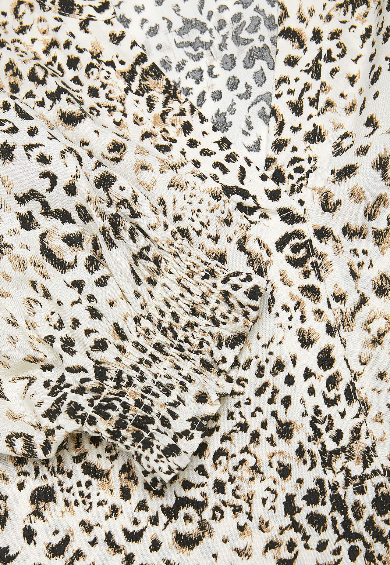 Tunika mit Smokarbeit an den Ärmelenden