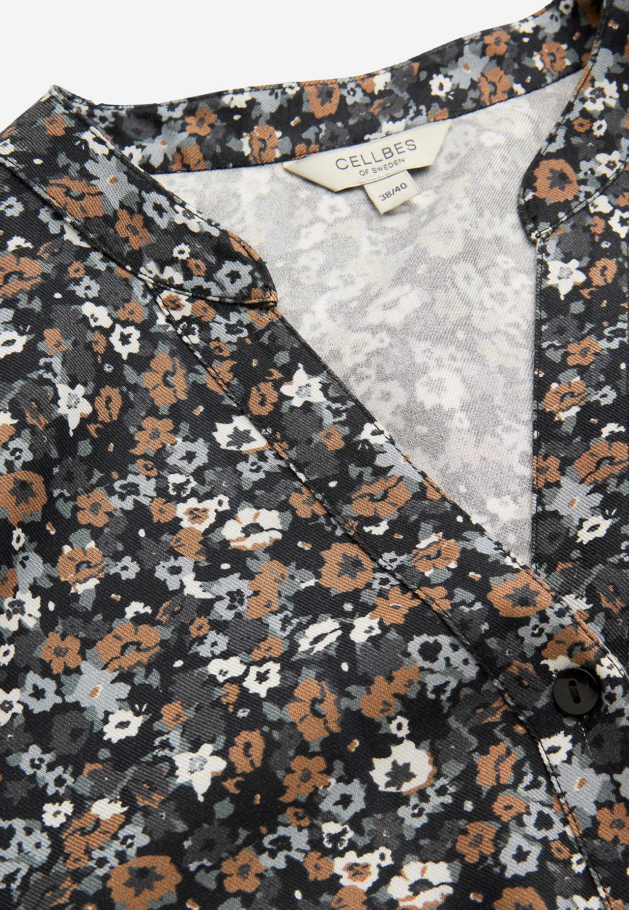 Gewebte Tunika mit Knöpfen