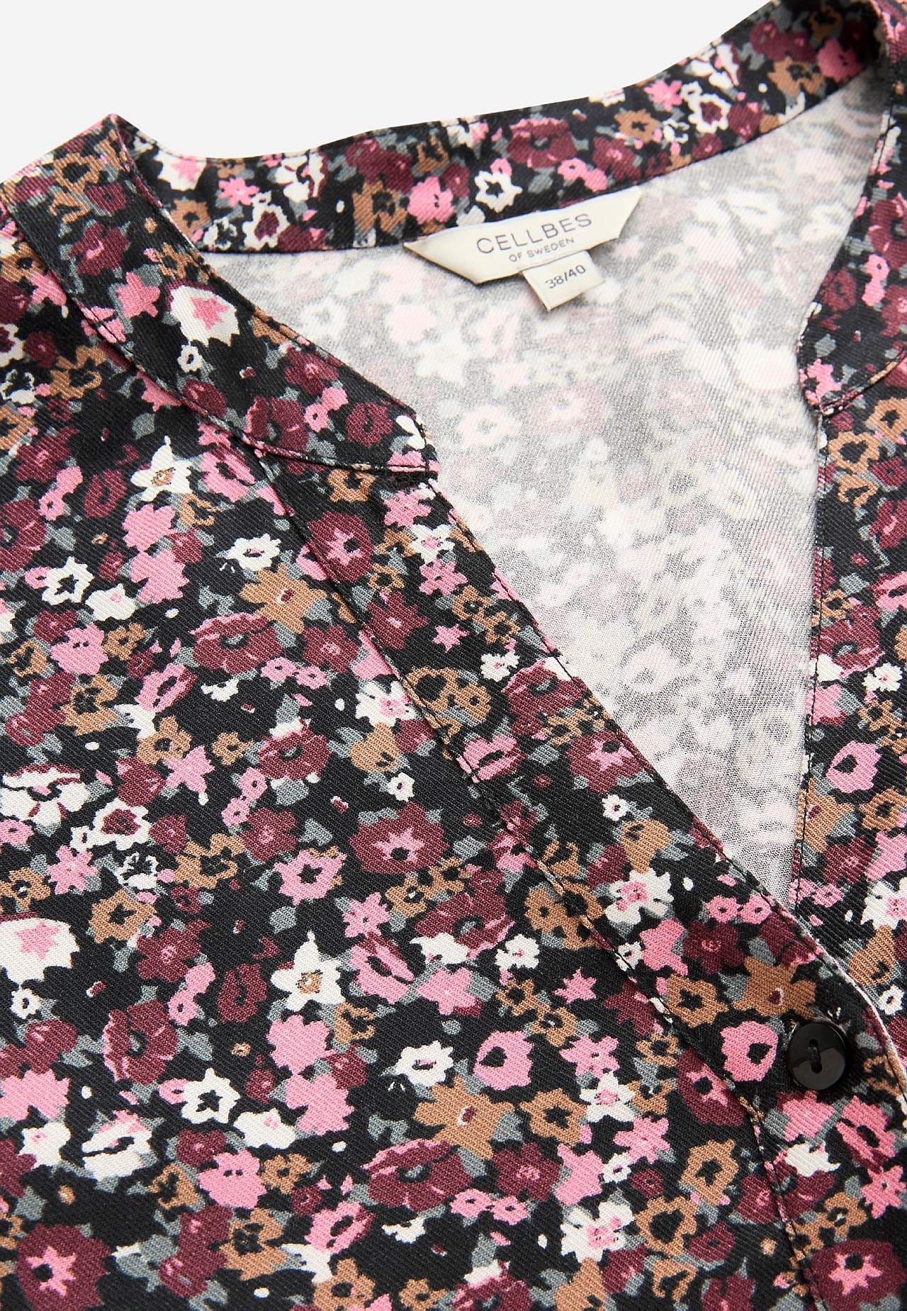 Gewebte Tunika mit Knöpfen