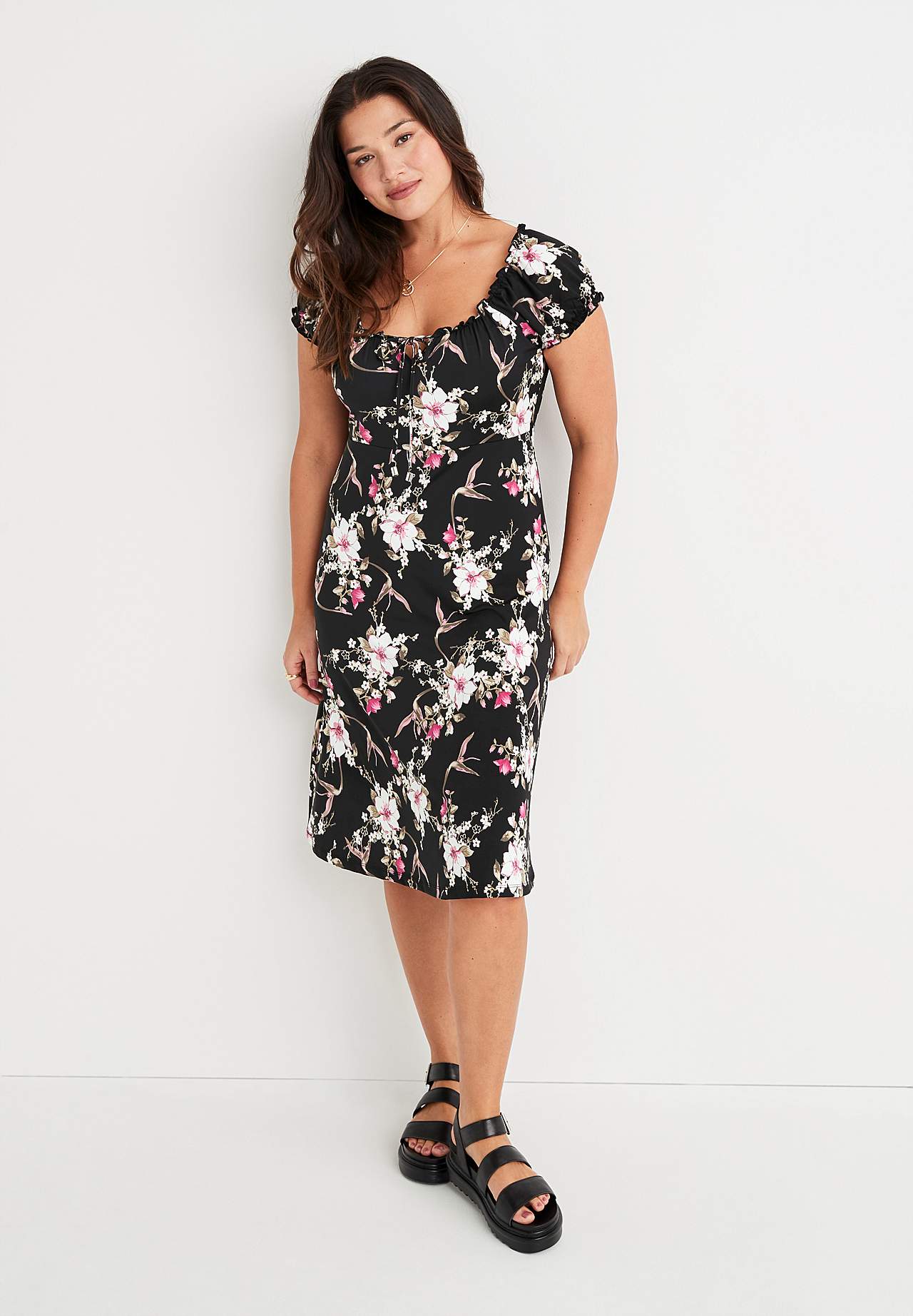 Gemustertes schulterfreies Kleid