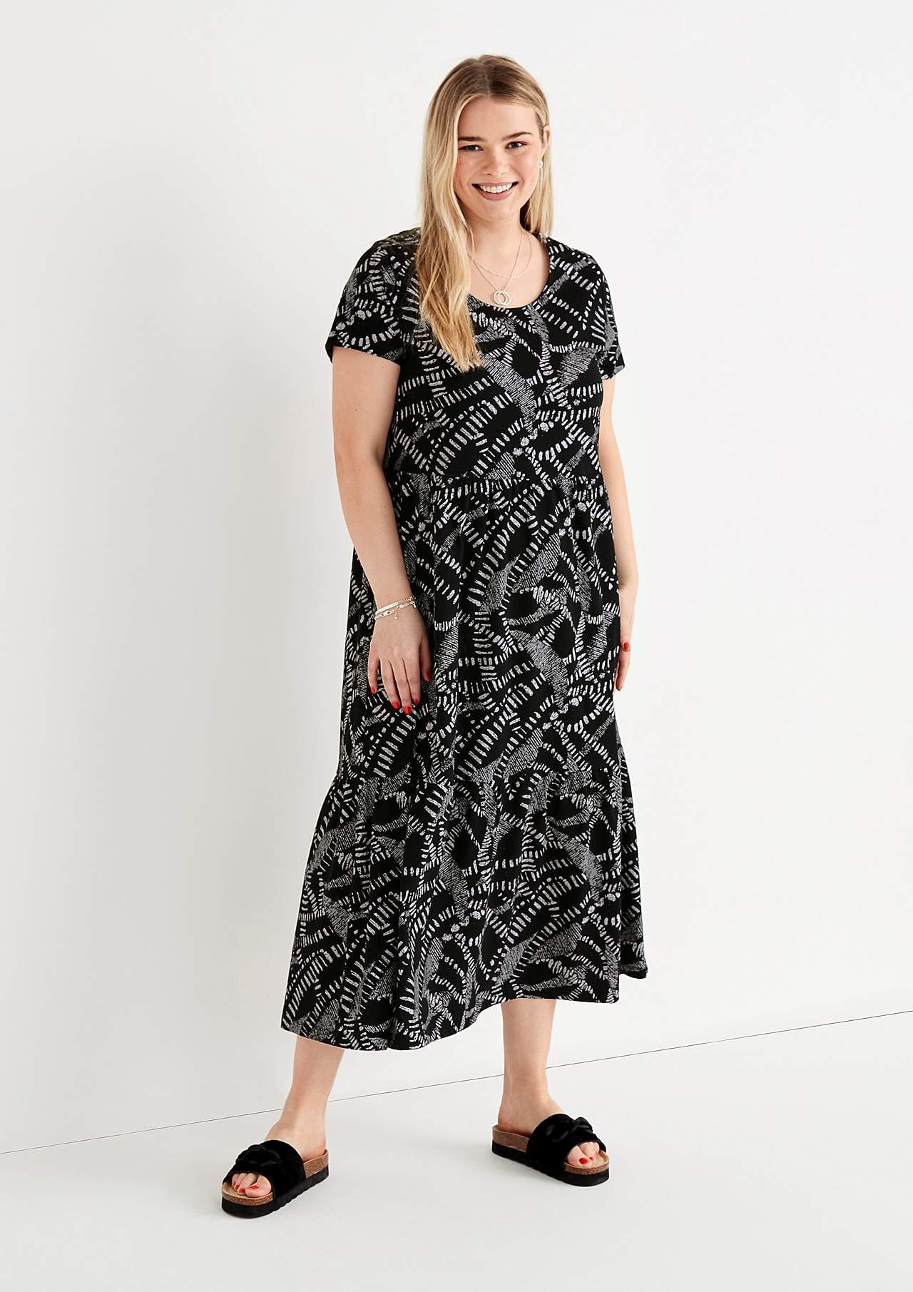 Gemustertes Jerseykleid mit Rüschenrock