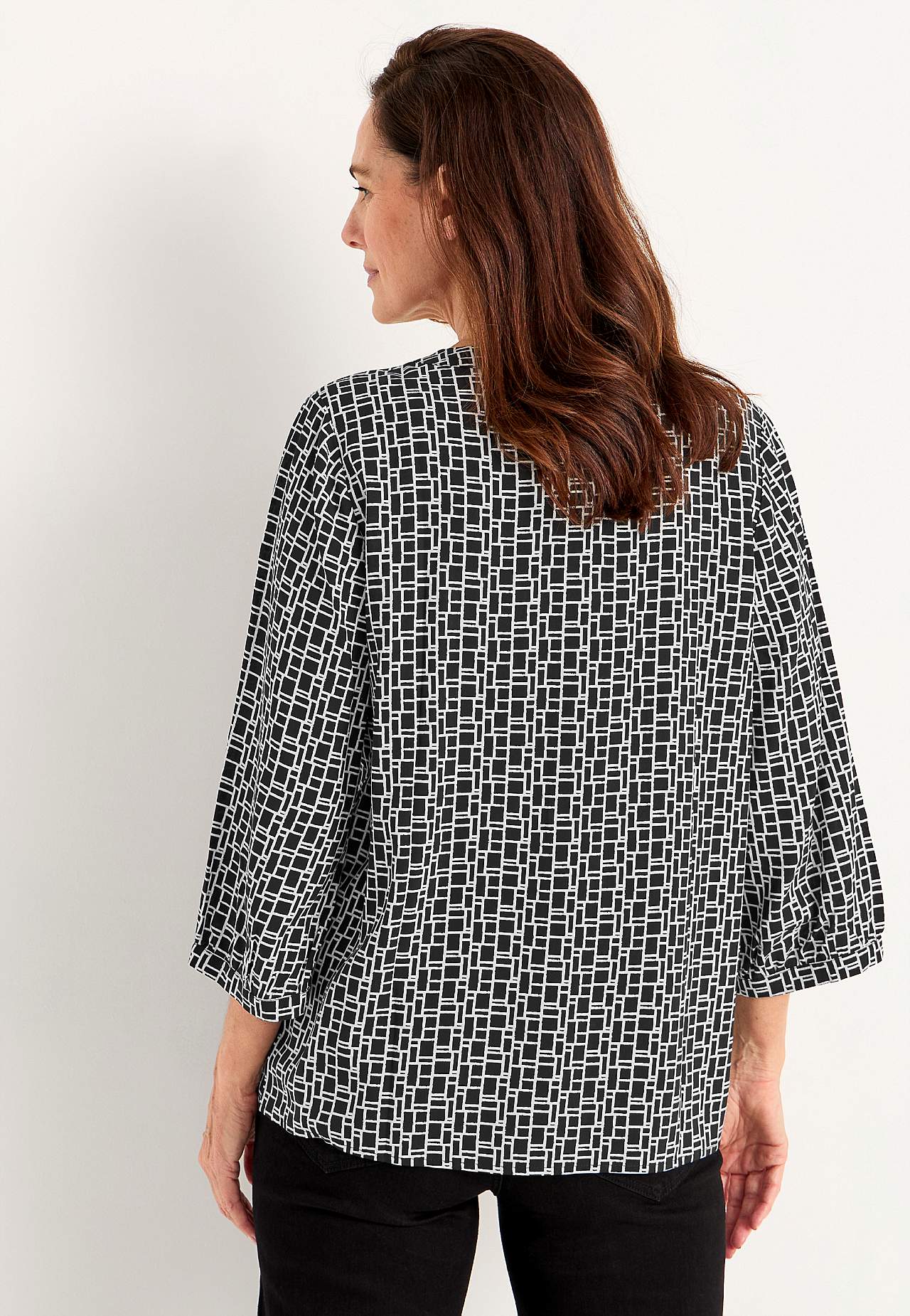 Gewebte Bluse mit einem V-Ausschnitt