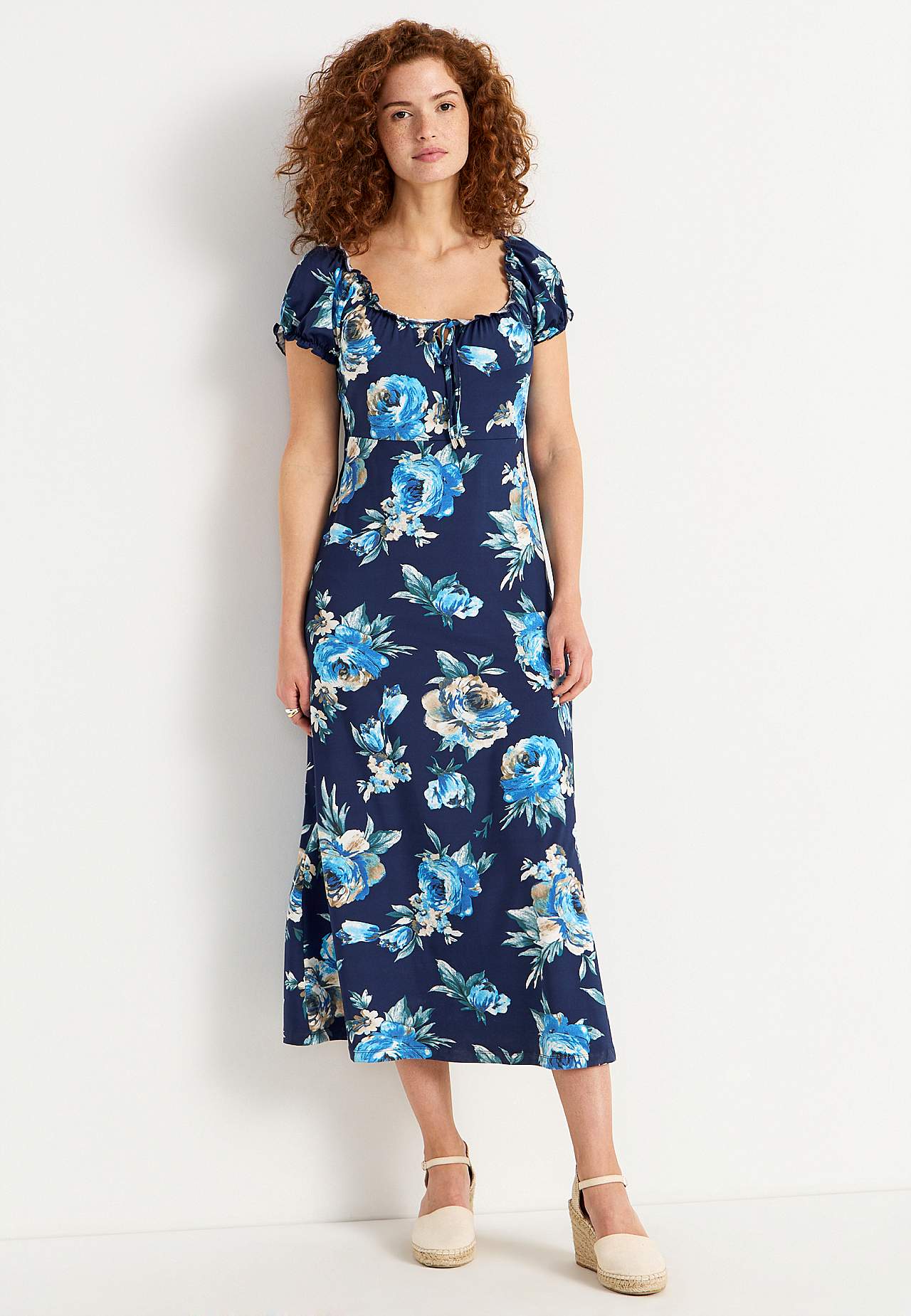 Langes, gemustertes schulterfreies Kleid