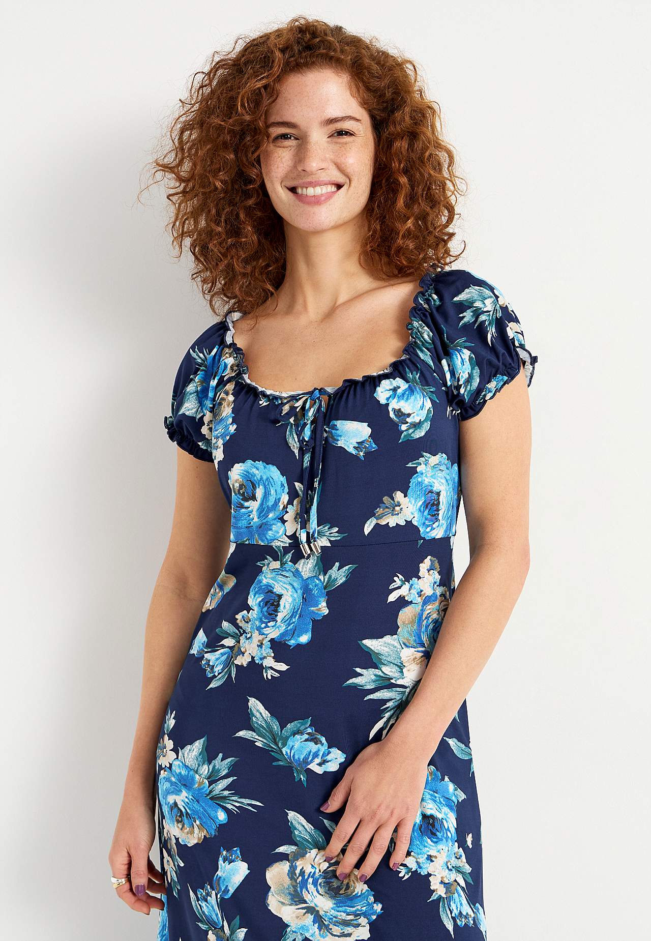 Langes, gemustertes schulterfreies Kleid