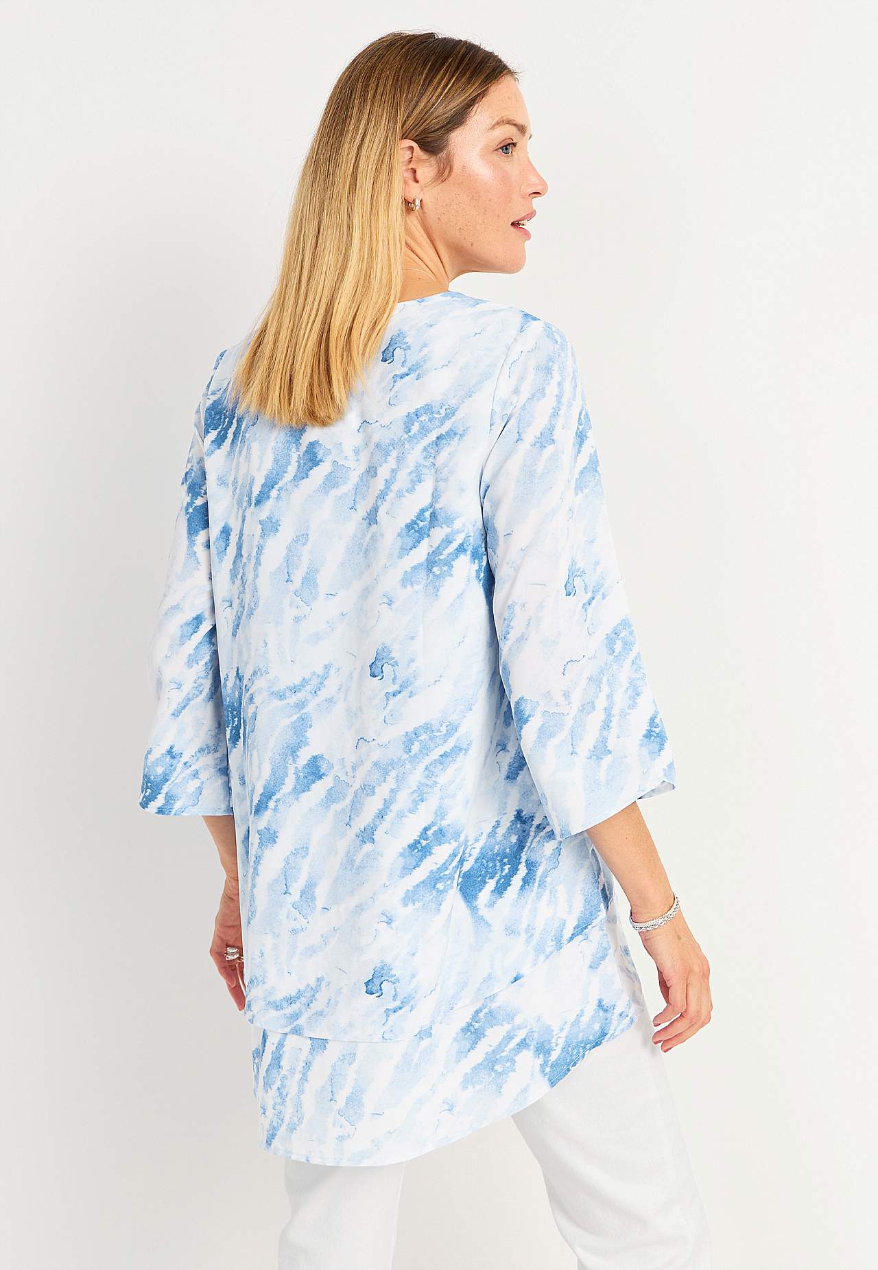 Tunika mit Trompetenärmel und einem V-Ausschnitt