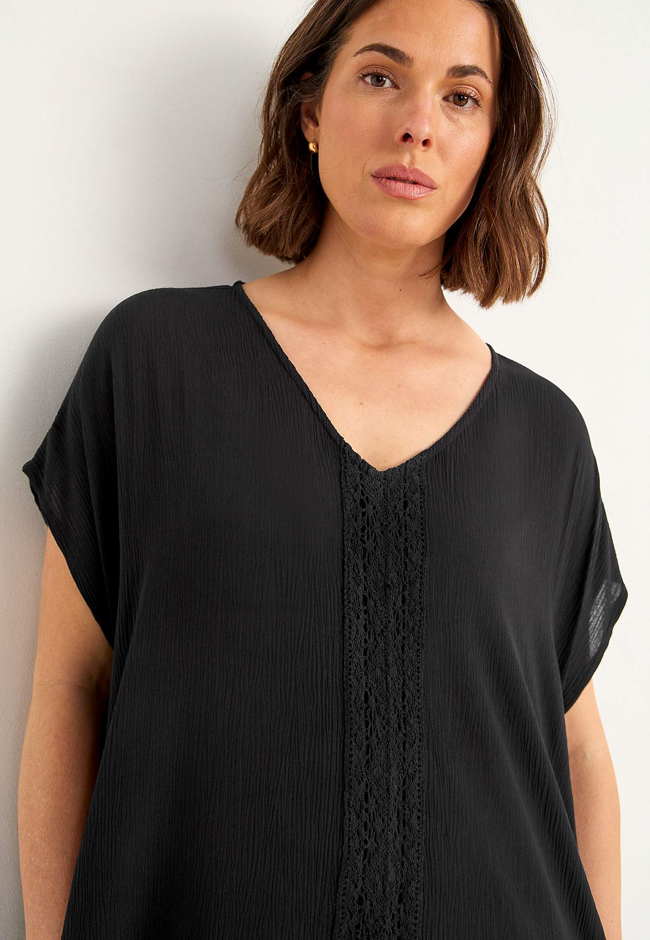 Kleid aus Krepp mit Taschen