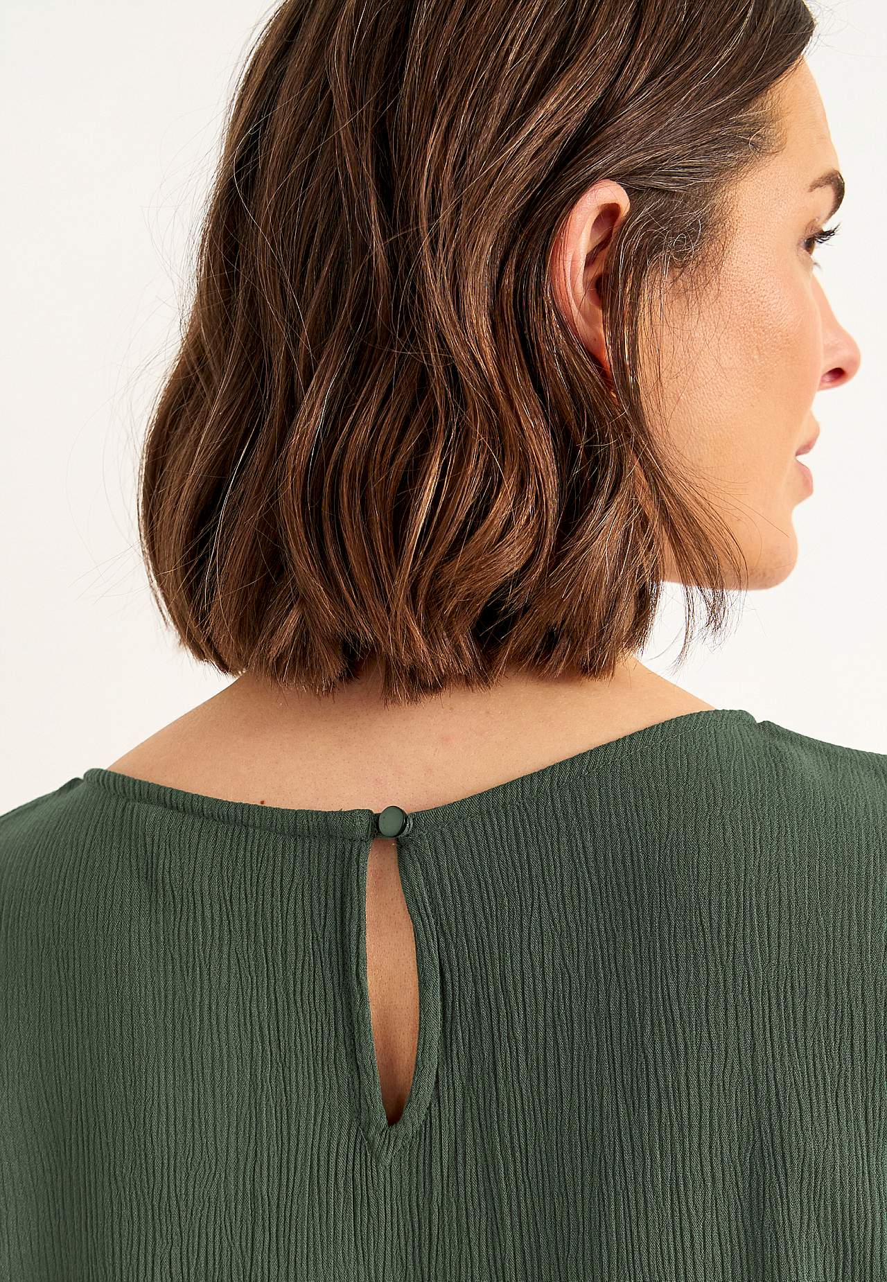Kleid aus Krepp mit Taschen