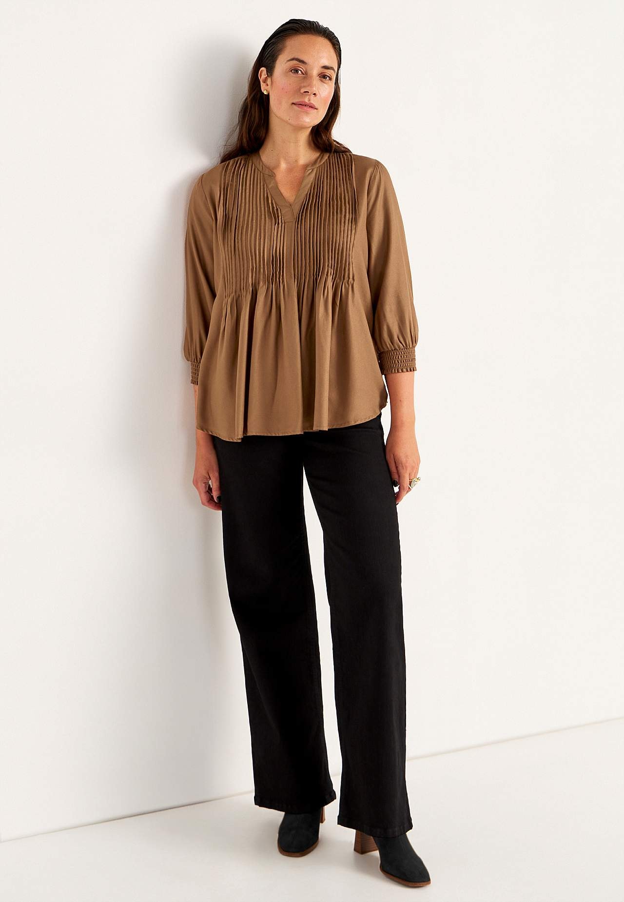 Bluse mit genähten Falten
