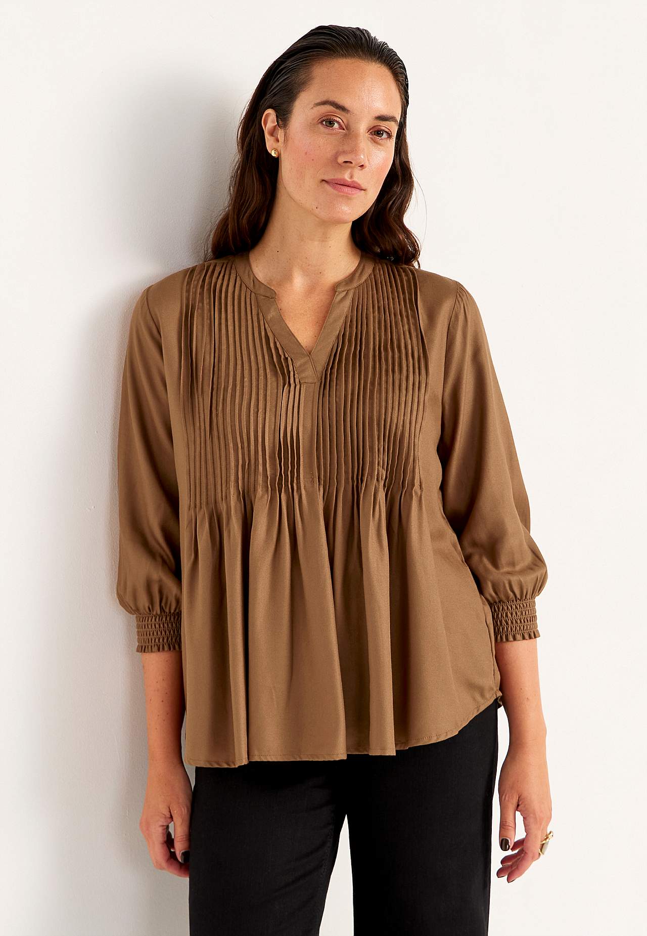 Bluse mit genähten Falten