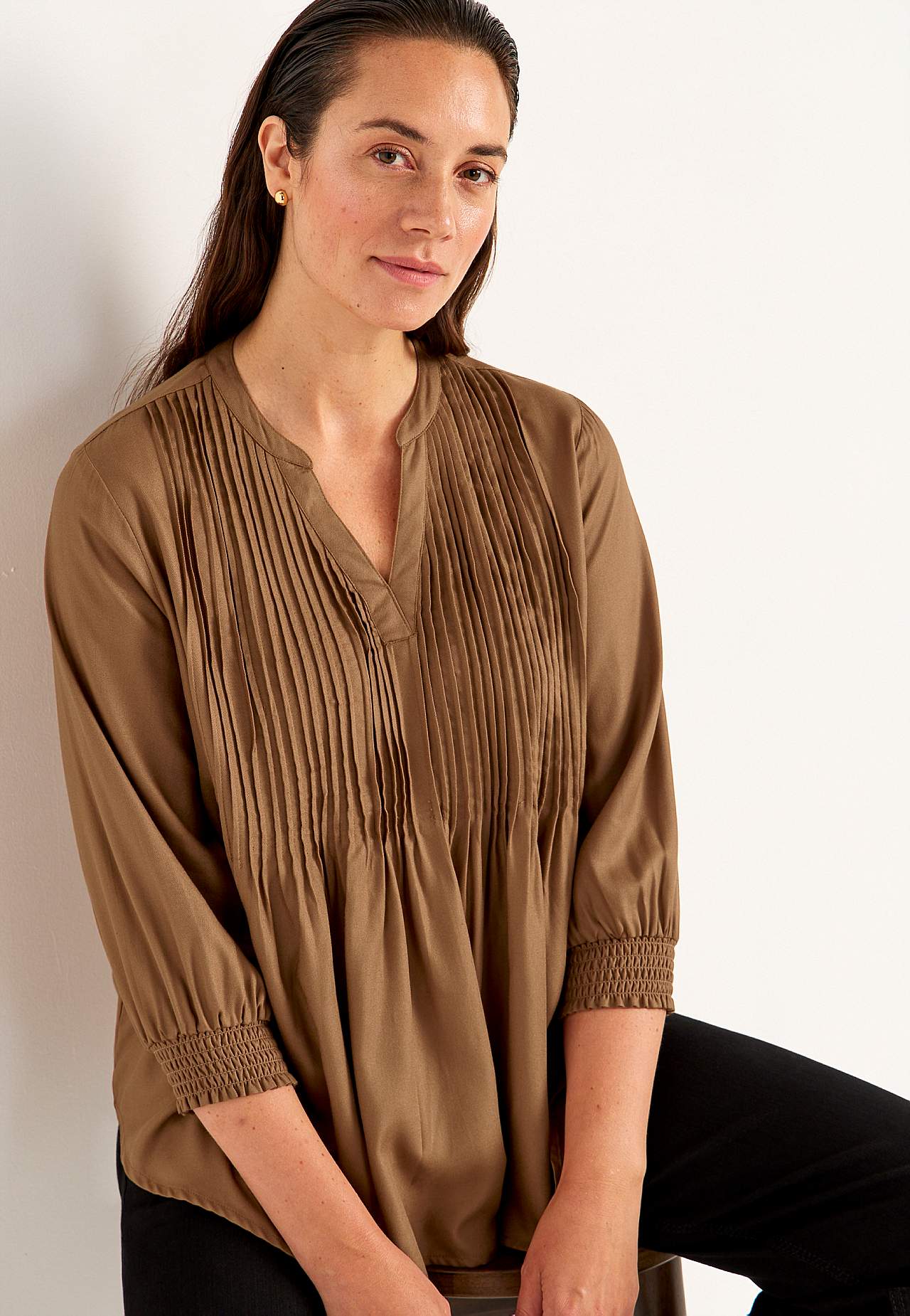 Bluse mit genähten Falten