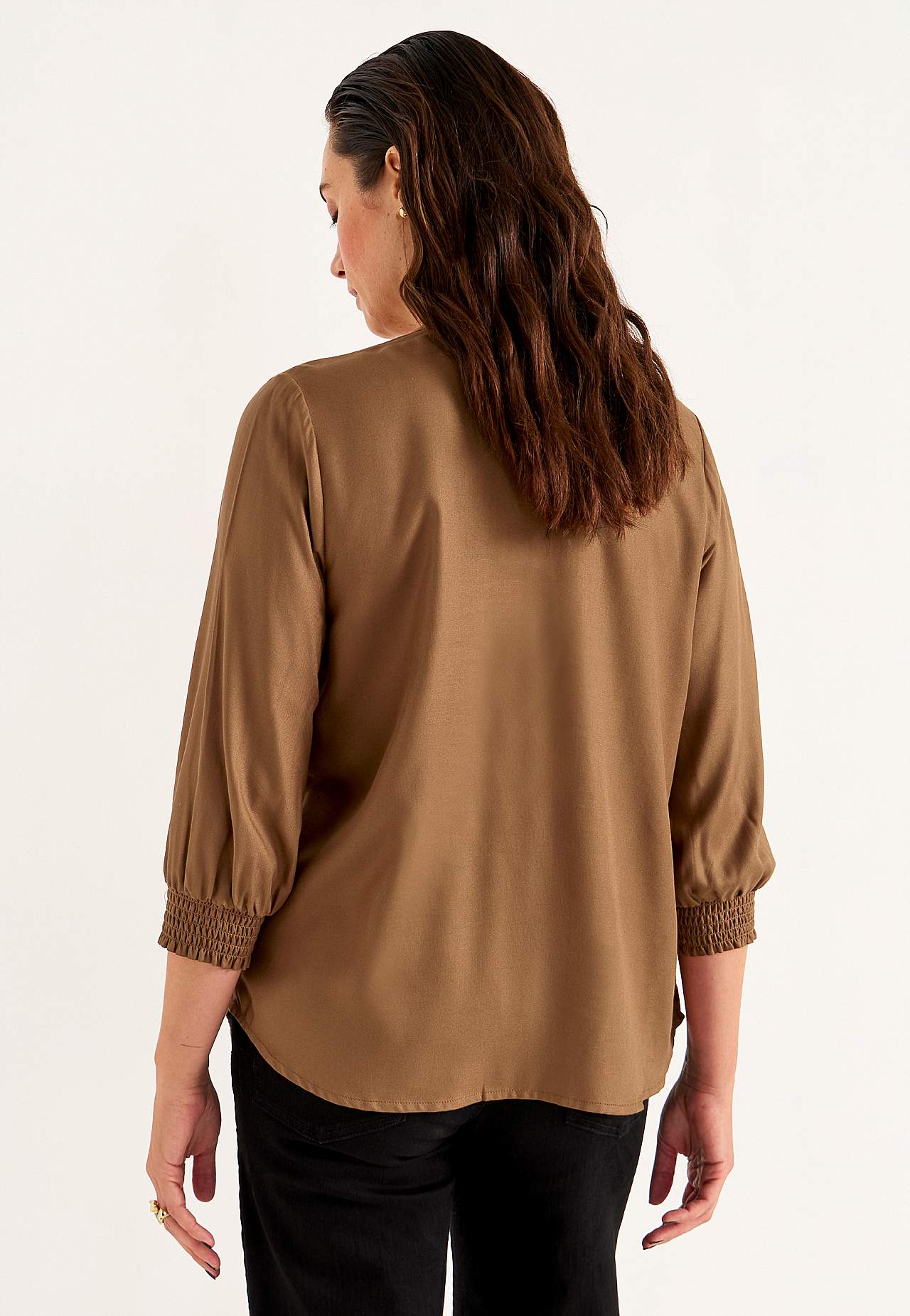 Bluse mit genähten Falten