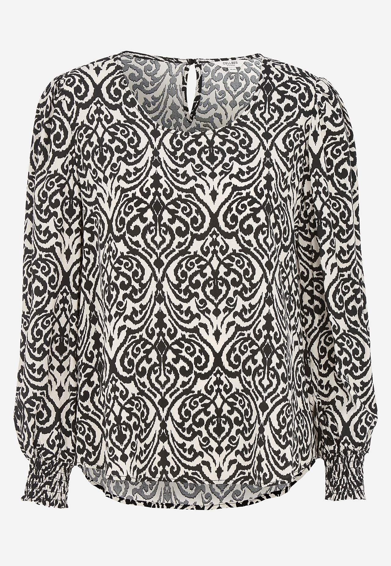 Bluse mit Smokarbeit an den Manschetten